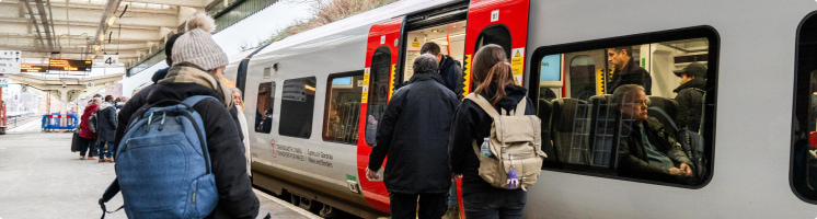Passengers waiting to board a TfW train